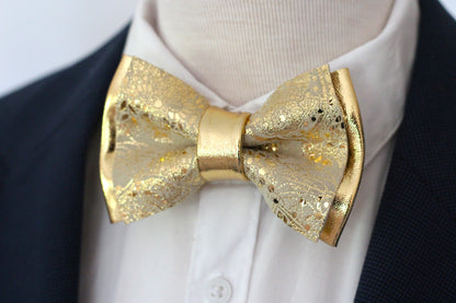Herrenfliege gold Leder
