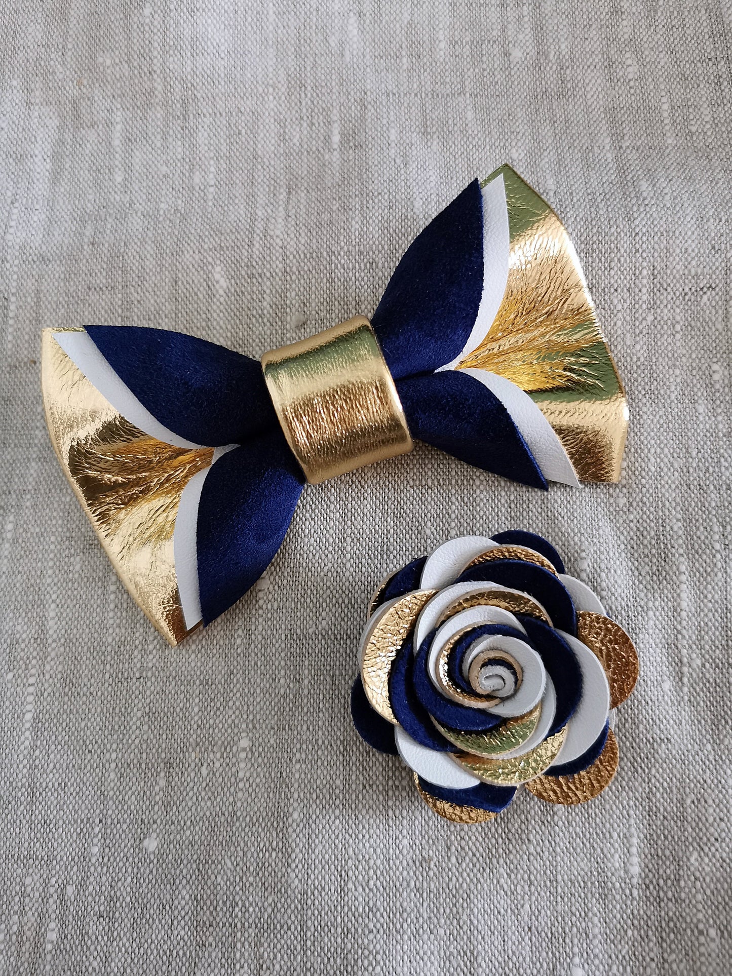 Herrenfliege gold Leder